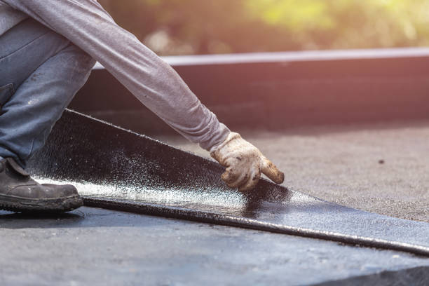 Professional Waterproofing technician working in Port Royal, KY